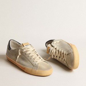 Golden Goose Super-Star Sneakers In Gray Nubuck With Perforated Star And Blue Heel Tab GMF00105.F004031.60400