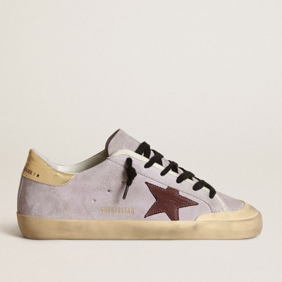 Golden Goose Super-Star Sneakers In Lilac Suede With A Brown Star And Gold Heel Tab GWF00107.F003421.45381